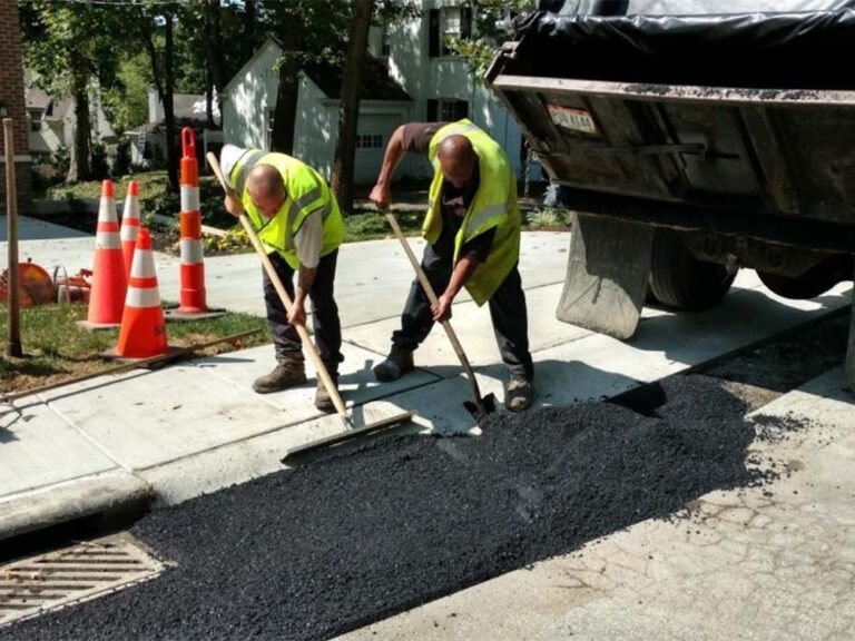 Crew doing asphalt repair.
